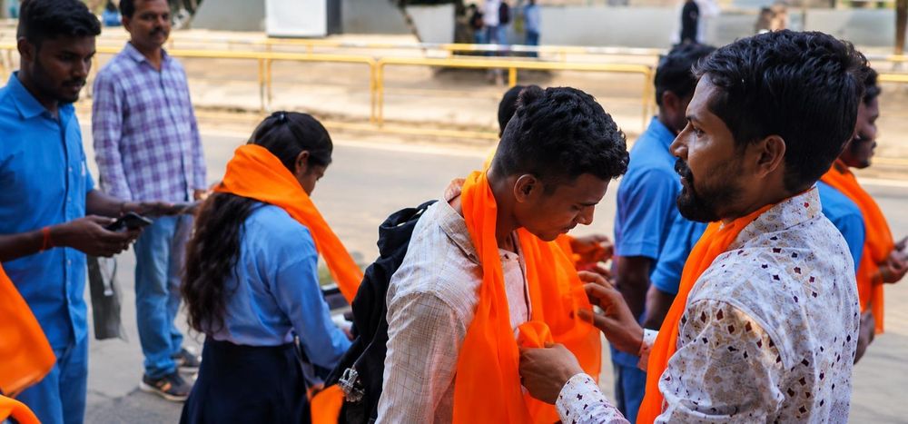 Sri Rama Sene activists hand out saffron shawls at Hubballi institutions after Karnataka reverses hijab restrictions