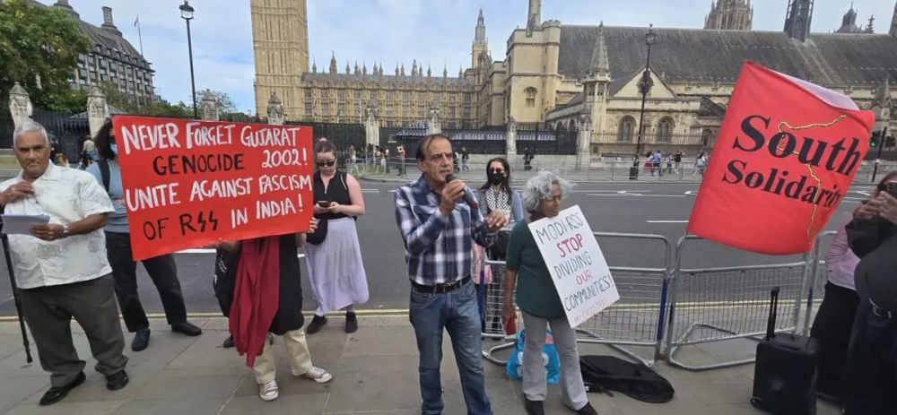 Hundreds Protest RSS UK Visit Cited As 'In Hiding'