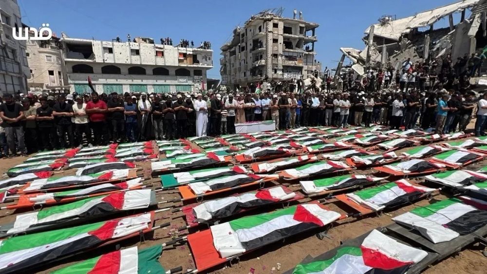 Maktoob: Thousands Bid Farewell as Gaza Buries 112 from Two Families in Israeli Genocide